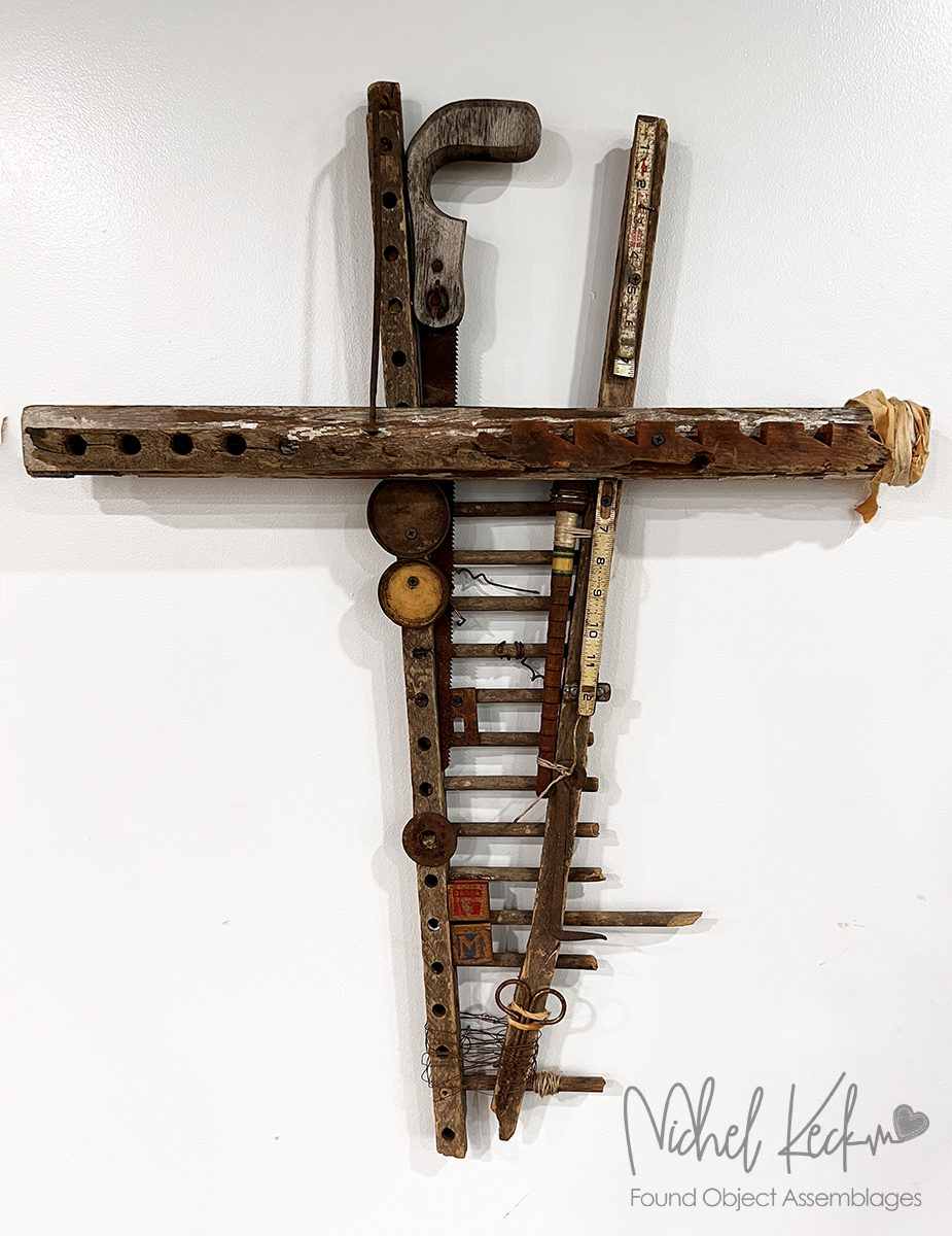 mixed media assemblage cross art made of found objects
